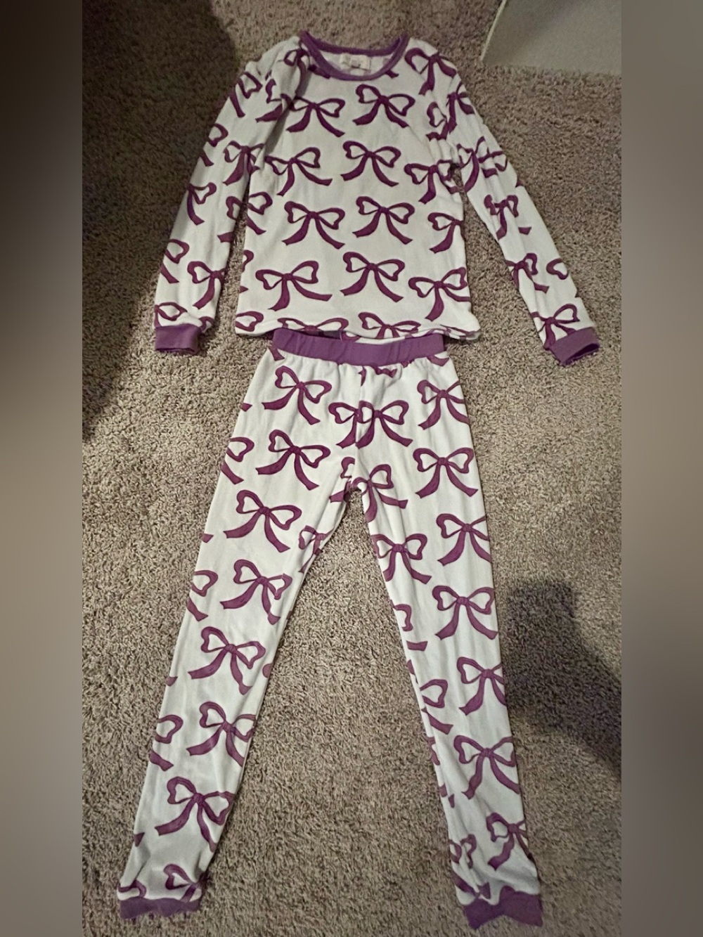 Jessica Simpson White Pajama Set with Purple Bow Print for girls.